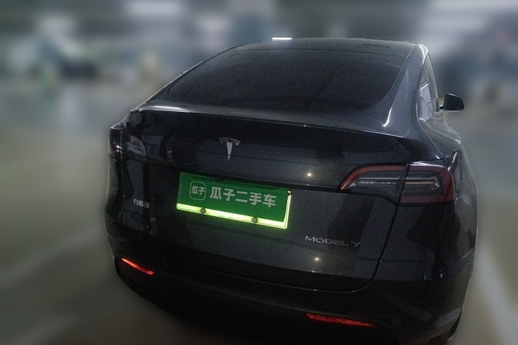 Tesla Model Y 2024 #4 Tesla Model Y 2024 car image #4