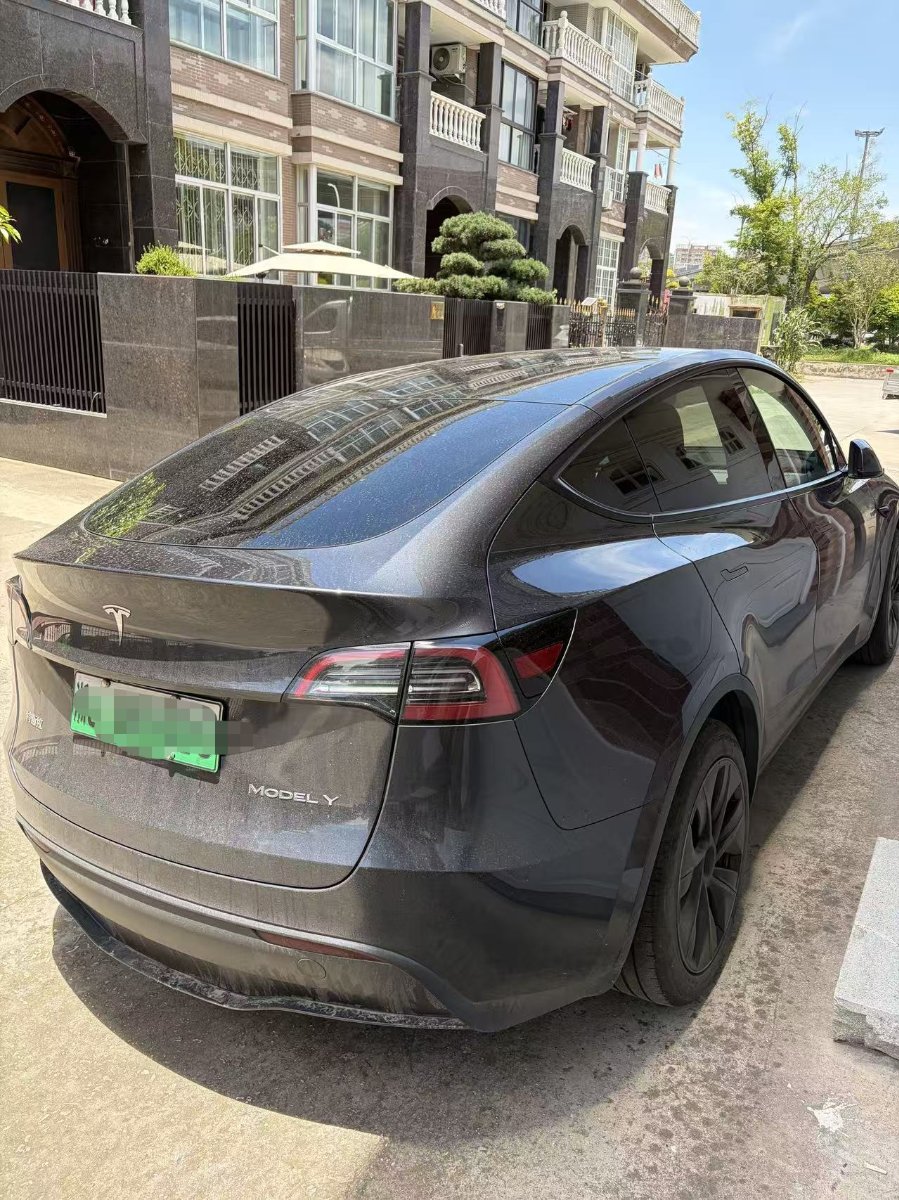 Tesla Model Y 2024 #4 Tesla Model Y 2024 car image #4