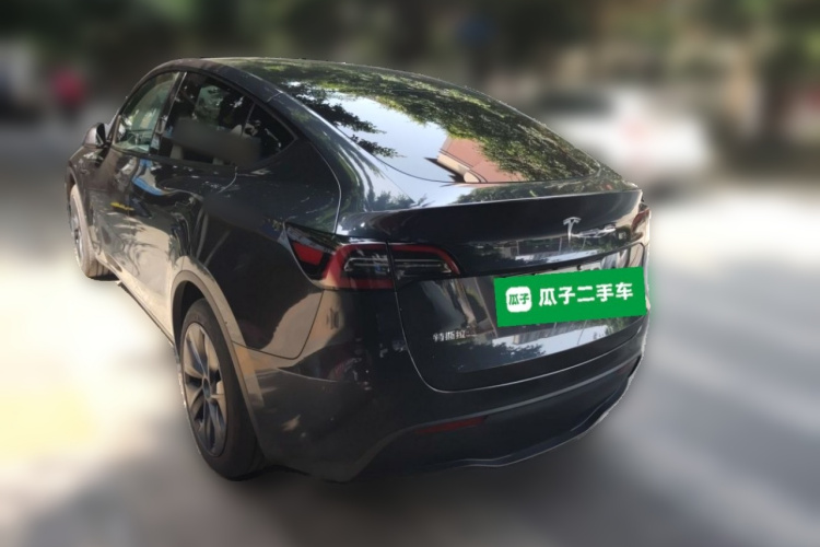 Tesla Model Y 2024 #5 Tesla Model Y 2024 car image #5