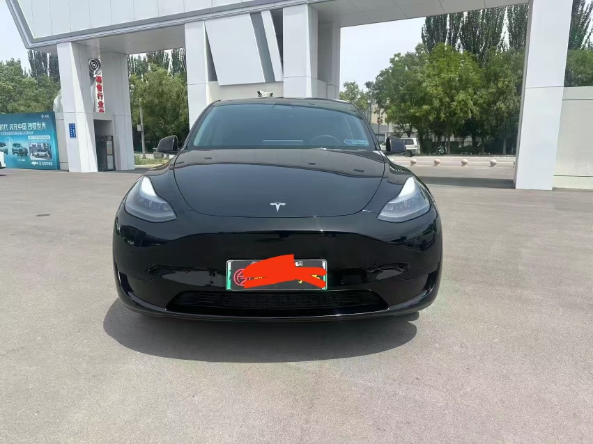 Tesla Model Y 2023 #2 Tesla Model Y 2023 car image #2