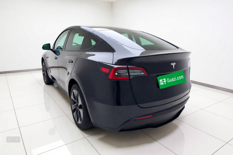 Tesla Model Y 2024 #5 Tesla Model Y 2024 car image #5