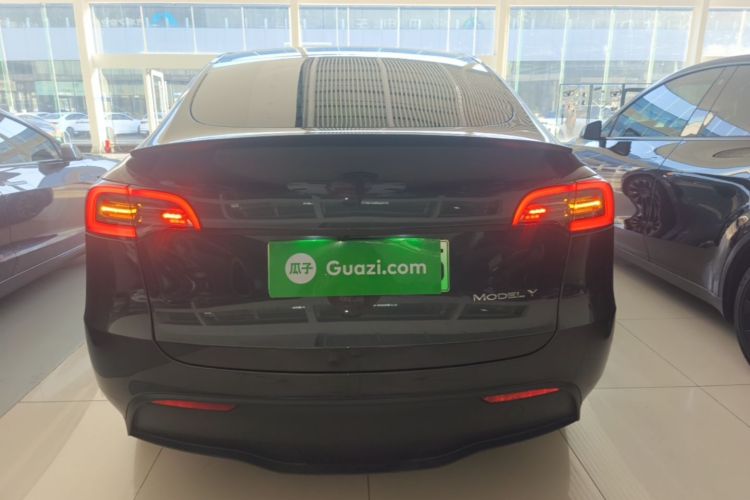 Tesla Model Y 2024 #6 Tesla Model Y 2024 car image #6