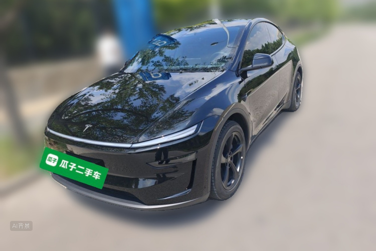 Tesla Model Y 2025 #2 Tesla Model Y 2025 car image #2