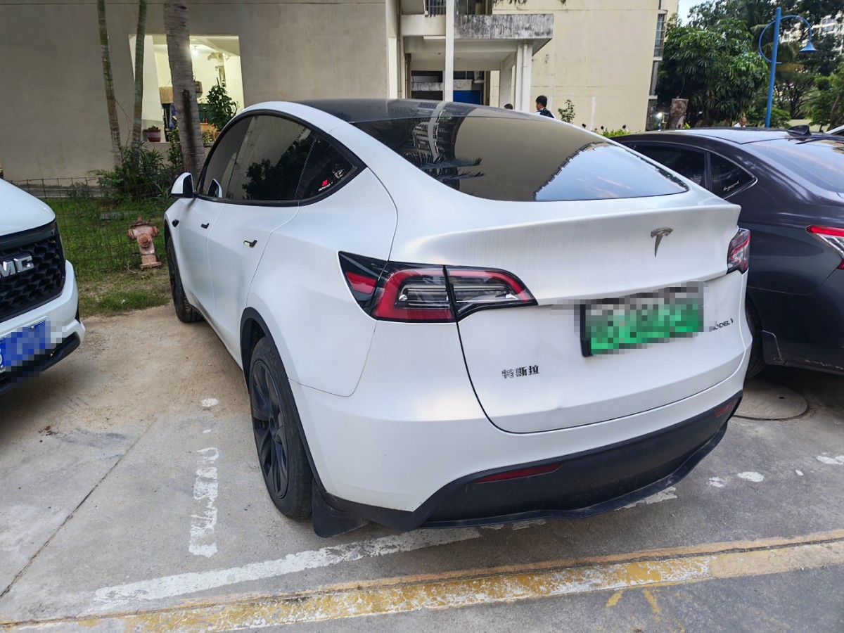 Tesla Model Y 2024 #4 Tesla Model Y 2024 car image #4