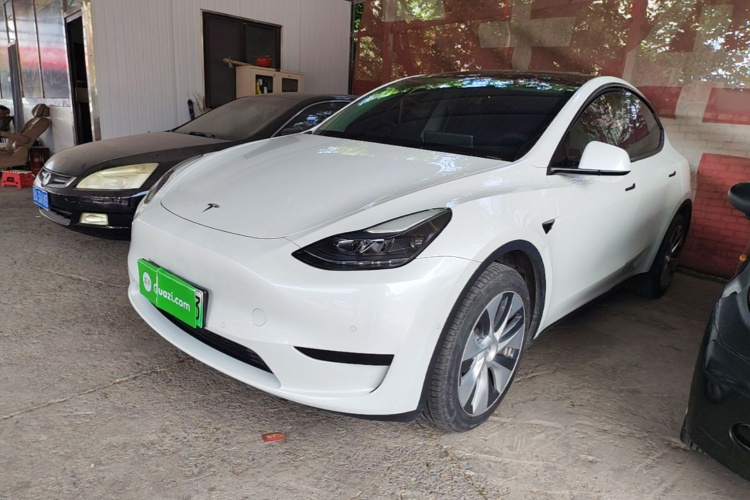 Tesla Model Y 2023 #2 Tesla Model Y 2023 car image #2