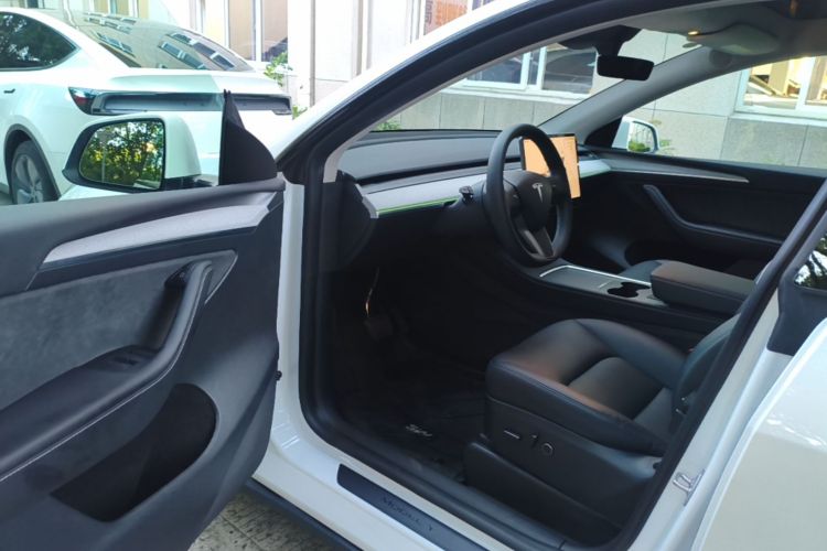 Tesla Model Y 2024 #16 Tesla Model Y 2024 car image #16