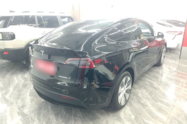 Tesla Model Y 2023 #5 Tesla Model Y 2023 car image #5