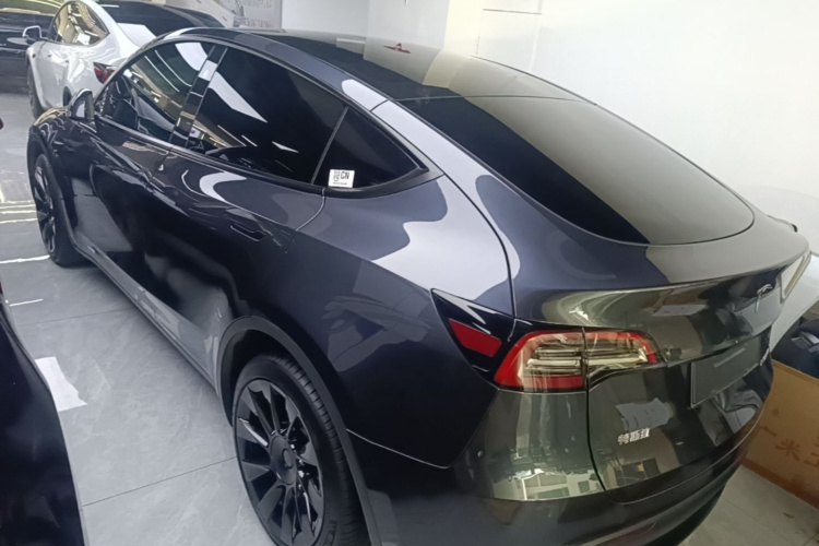 Tesla Model Y 2024 #7 Tesla Model Y 2024 car image #7