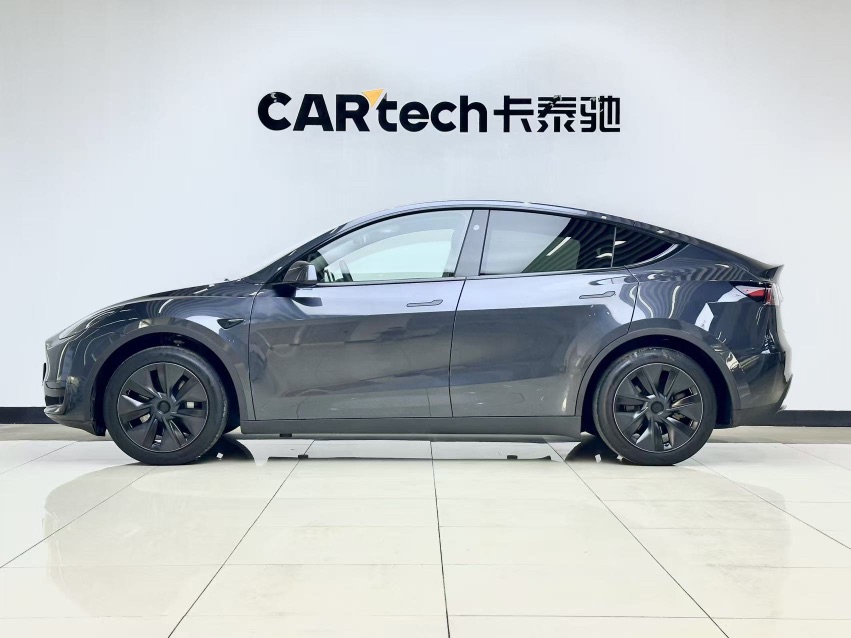 Tesla Model Y 2024 #5 Tesla Model Y 2024 car image #5