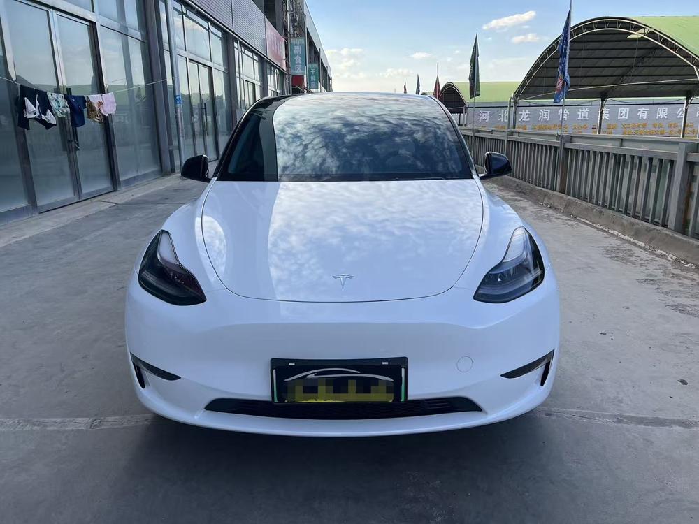 Tesla Model Y 2023 #2 Tesla Model Y 2023 car image #2