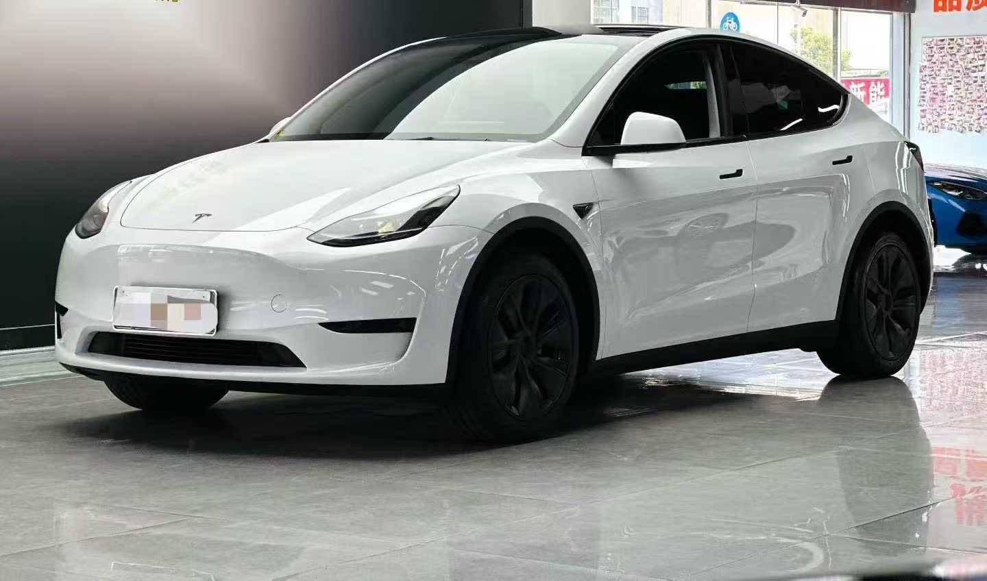 Tesla Model Y 2024 #2 Tesla Model Y 2024 car image #2