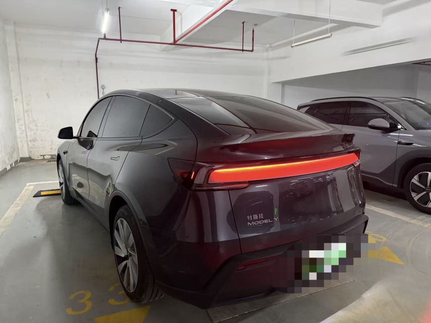 Tesla Model Y 2025 imagen de coche #6