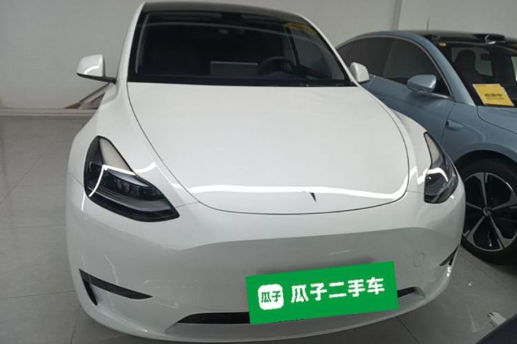 Tesla Model Y 2024 #3 Tesla Model Y 2024 car image #3