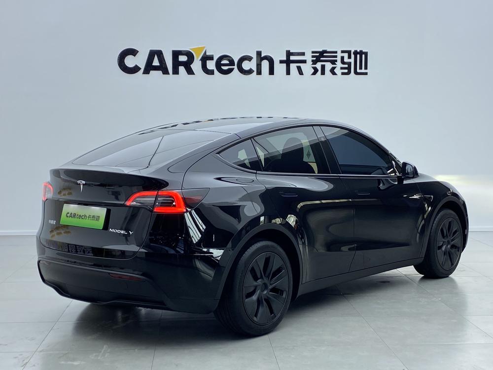 Tesla Model Y 2024 #4 Tesla Model Y 2024 car image #4