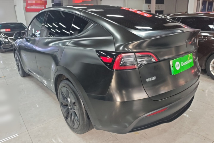 Tesla Model Y 2024 #5 Tesla Model Y 2024 car image #5