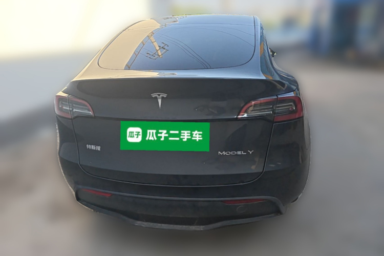 Tesla Model Y 2024 #6 Tesla Model Y 2024 car image #6