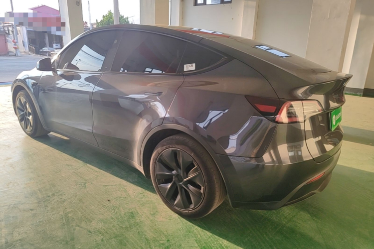 Tesla Model Y 2024 #5 Tesla Model Y 2024 car image #5
