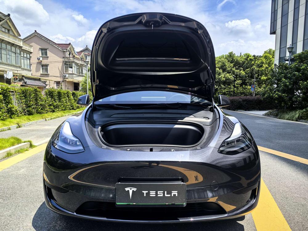 Tesla Model Y 2024 #9 Tesla Model Y 2024 car image #9
