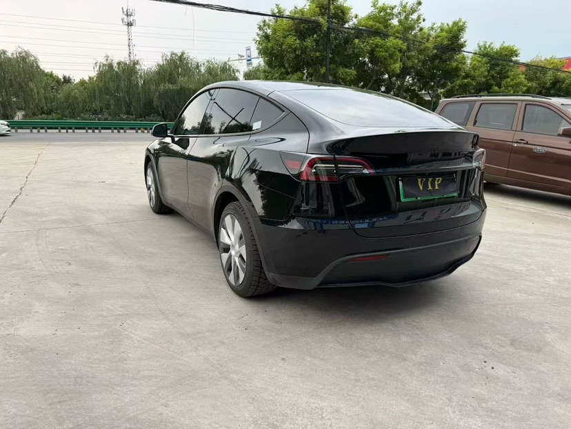 Tesla Model Y 2023 #6 Tesla Model Y 2023 car image #6