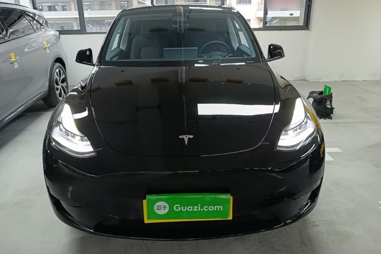 Tesla Model Y 2024 #3 Tesla Model Y 2024 car image #3