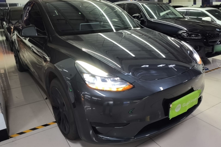 Tesla Model Y 2024 #4 Tesla Model Y 2024 car image #4
