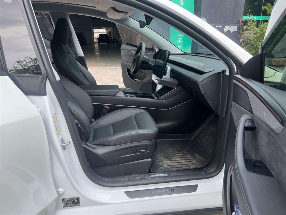 Tesla Model Y 2025 #15 Tesla Model Y 2025 car image #15