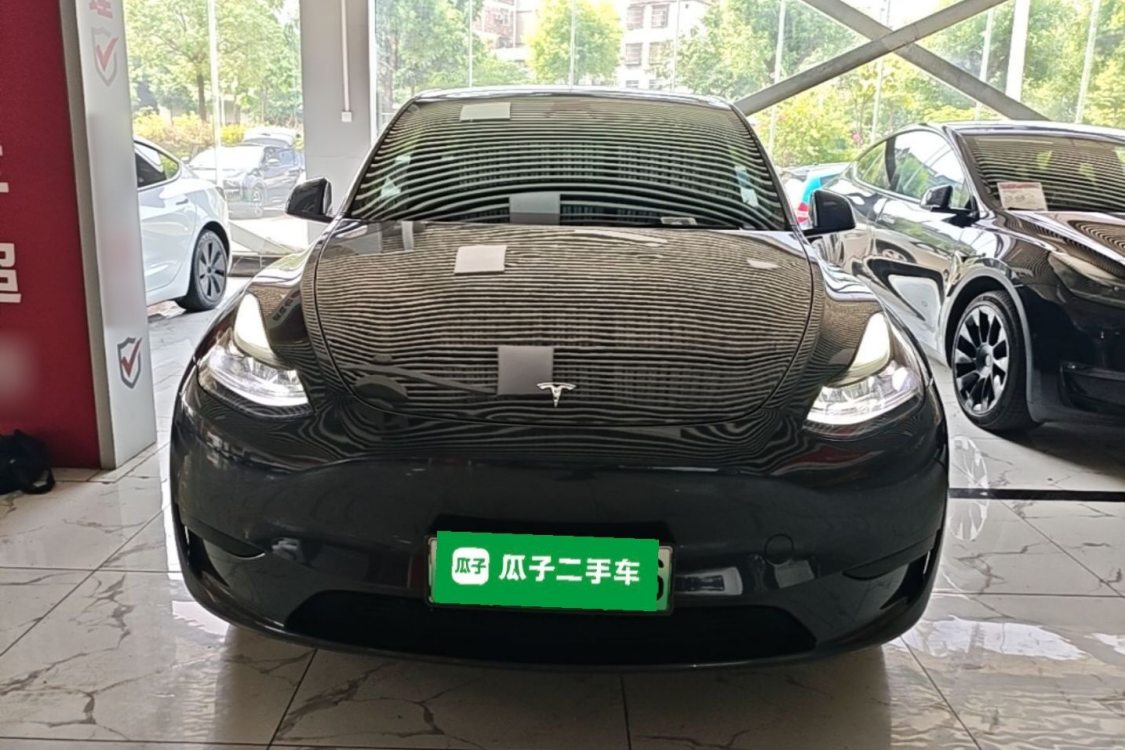 Tesla Model Y 2024 #5 Tesla Model Y 2024 car image #5
