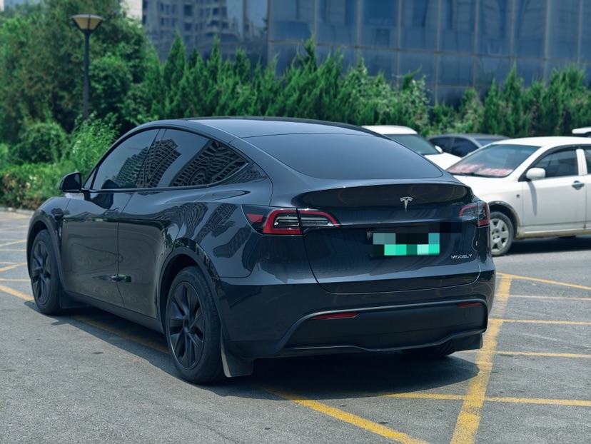 Tesla Model Y 2024 #5 Tesla Model Y 2024 car image #5