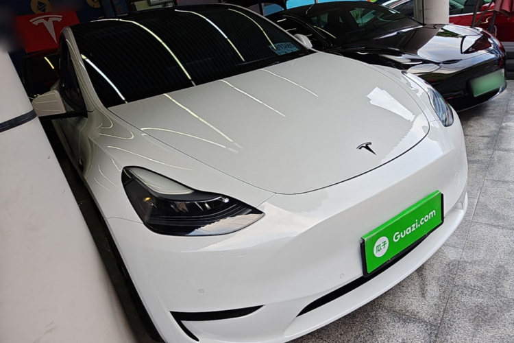 Tesla Model Y 2023 #4 Tesla Model Y 2023 car image #4