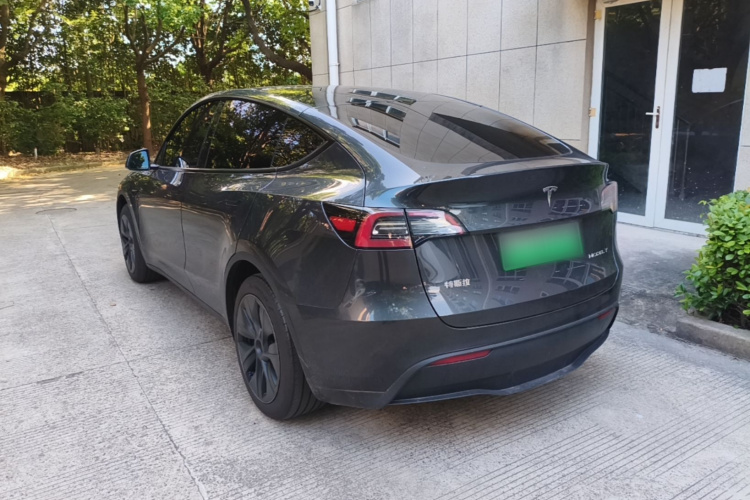Tesla Model Y 2024 #7 Tesla Model Y 2024 car image #7