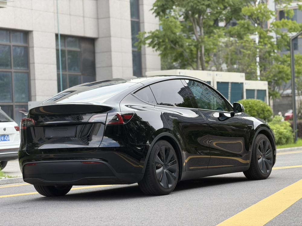 Tesla Model Y 2023 #7 Tesla Model Y 2023 car image #7
