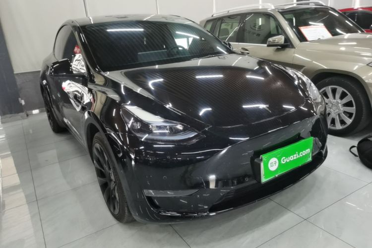 Tesla Model Y 2023 #4 Tesla Model Y 2023 car image #4