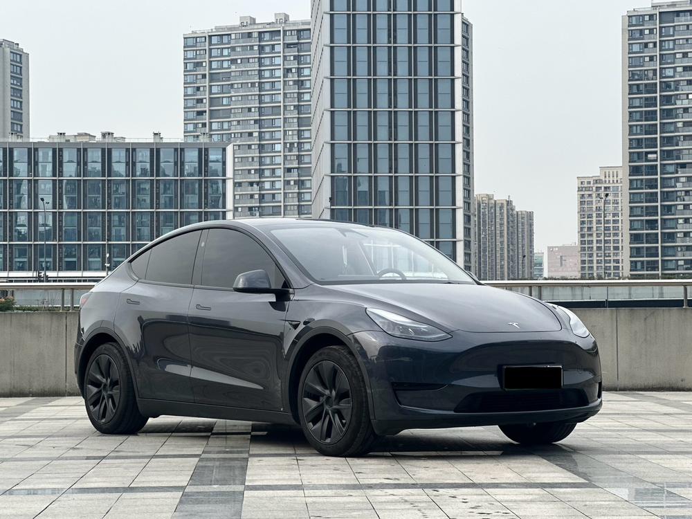Tesla Model Y 2024 #3 Tesla Model Y 2024 car image #3