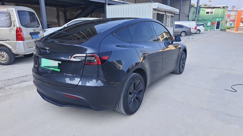 Tesla Model Y 2024 #3 Tesla Model Y 2024 car image #3