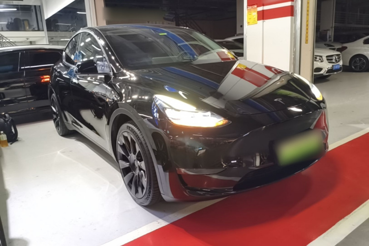 Tesla Model Y 2023 #4 Tesla Model Y 2023 car image #4