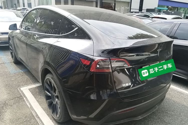 Tesla Model Y 2023 #5 Tesla Model Y 2023 car image #5