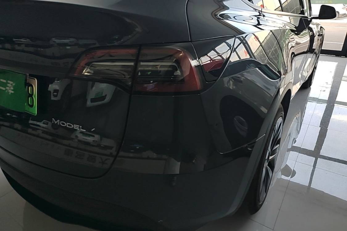 Tesla Model Y 2024 #7 Tesla Model Y 2024 car image #7