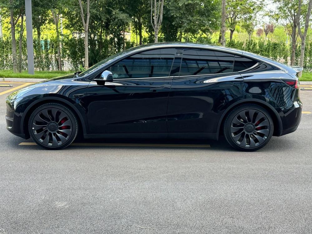 Tesla Model Y 2023 #4 Tesla Model Y 2023 изображение автомобиля #4