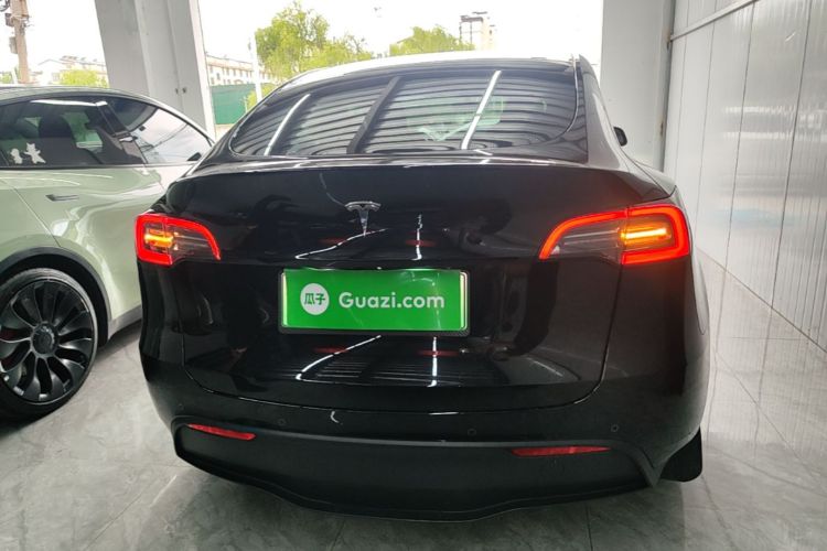 Tesla Model Y 2023 #6 Tesla Model Y 2023 car image #6
